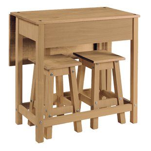 a wooden table and stools with one chair at the top, set against a white background