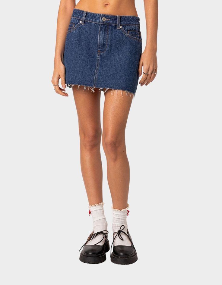 This Denim Mini Skirt Is The Ultimate Go-To Piece For All Your Spring/summer Plans. This Classic Staple Will Go With Everything In Your Closet, So You'll Never Be Left Wondering What To Wear. Mini Skirt. Denim Fabric. 100% Cotton. Model Wears Size S. Model Height Is 5'7. Item Care: Machine Wash At Maximum Of 30ºc, Do Not Bleach, Tumble Dry Low, Iron At A Maximum Of 110ºc, Do Not Dry Clean. | Edikted Jessie Denim Mini Skirt Fitted Mid-rise Denim Skirt For Summer, Fitted Mid-rise Summer Mini Skirt, Fitted Mid-rise Mini Skirt For Summer, Summer Denim Skort For Day Out, Summer Fitted Medium Wash Skort, Fitted Medium Wash Skort For Summer, Summer Fitted Mid-rise Skort, Casual High Waist Dark Wash Skort, Fitted Mid-rise Summer Skirt