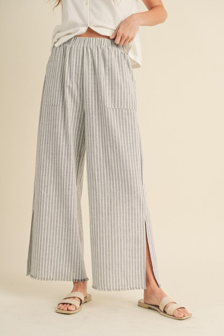 DescriptionThe Seaside Striped Linen Pants feature: Raw edge Side pockets Side slits Wide leg Elastic waistband FitRelaxed, true to size MaterialLinen / Cotton Striped Linen Pants, Unisex Clothes, Linen Pant, Wide Leg Linen Pants, Striped Linen, Linen Pants, Granada, Raw Edge, Hat Hairstyles