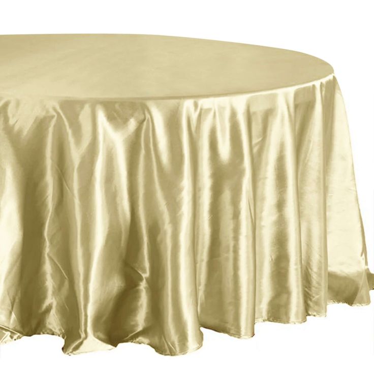 a round table with a gold cloth on it