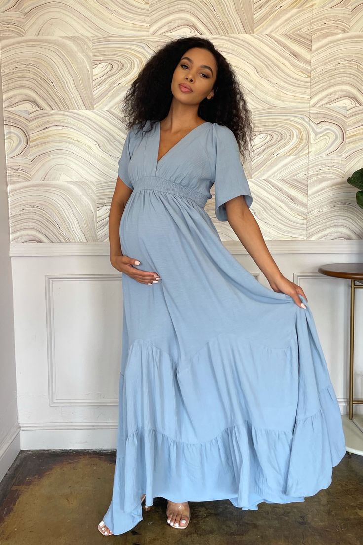 Bobby is boho chic at her best, with her wide neckline & bellowing multi-paneled hem. This gown is perfect for a Bohemian-themed shower. or photoshoot, and can be worn again and again throughout pregnancy and after baby arrives. The Bobby Maxi Dress is a lightweight cotton with a soft stretchy waistband for you and your baby’s comfort. Available in 3 colours: Misty Rose, Light Steel Blue, Off White Modest Flowy Maxi Dress With Empire Waist, Modest Maxi Length Maternity Dresses, Flowy Bohemian Dress With Empire Waist, Flowy Maternity Dress For The Beach, Flowy Maternity Dress For Beach, Summer Nursing-friendly Maternity Dress, Flowy Maxi Maternity Dress For The Beach, Flowy Maternity Maxi Dress For Beach, Flowy Maxi-length Maternity Dress For Beach