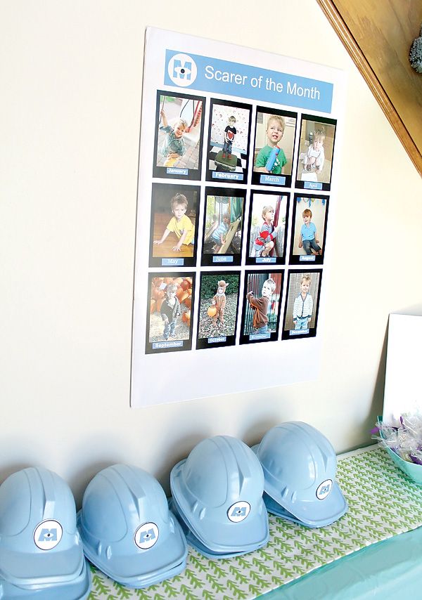 a group of blue hard hats sitting on top of a table next to a poster