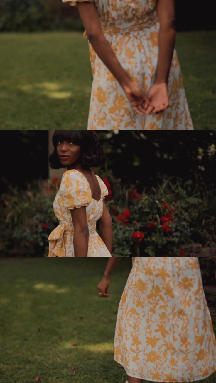 a woman in a yellow and white dress is walking through the grass with her hand on her hip