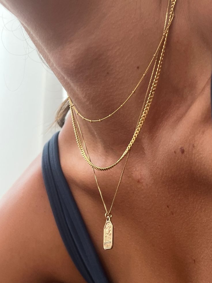 A new chain style in the Olaeda family! The most requested satellite chain is finally here. And, it's available in a choker and necklace length. Cheers to new beginnings. This chain will be a game changer to your layering stack. It's super dainty with an injection of texture and character. - 14k gold filled - Available in 15" & 16" long Gold Layered Chains, Daily Necklace Stack, Minimalist Necklace Stack, Gold Chain Layering, Gold Necklace Stack Ideas, Gold Stack Necklace, Dainty Gold Necklace Stack, Gold Necklace Combo, Necklace Stacks Gold