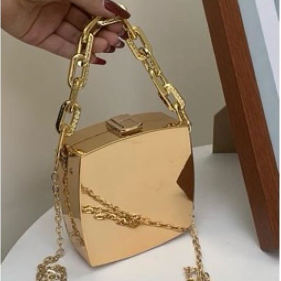 Gold Lock Chain Gold Satchel Bag Brand New Still In Plastic Rectangular Chain Bag As Gift, Trendy Square Chain Bag As Gift, Square Bag With Chain For Gift, Square Bag With Chain As A Gift, Gold Box Shoulder Bag With Chain Strap, Gold Shoulder Box Bag With Chain Strap, Handheld Bags With Chain Strap As Gift, Handheld Bags With Chain Strap For Gifts, Trendy Portable Gold Clutch