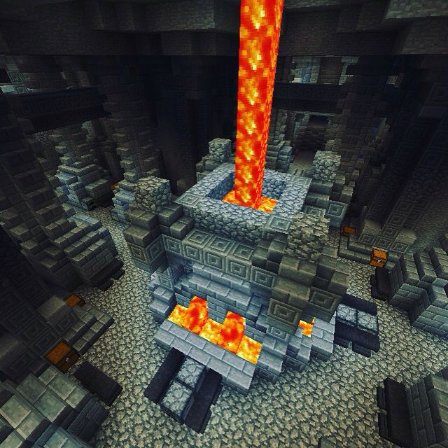 an image of a fire pillar in the middle of a minecraft environment with rocks and stones