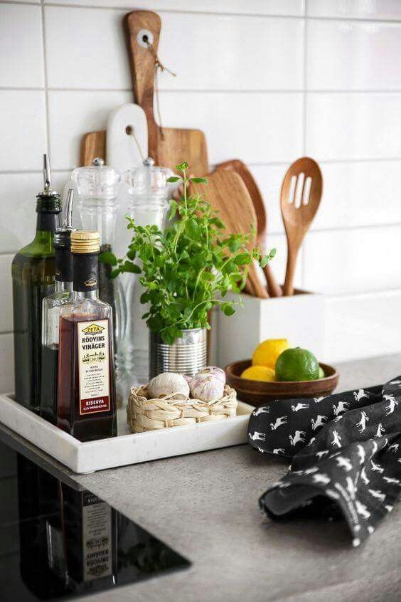 the kitchen counter is covered with spices, herbs and condiments to make an appetizer