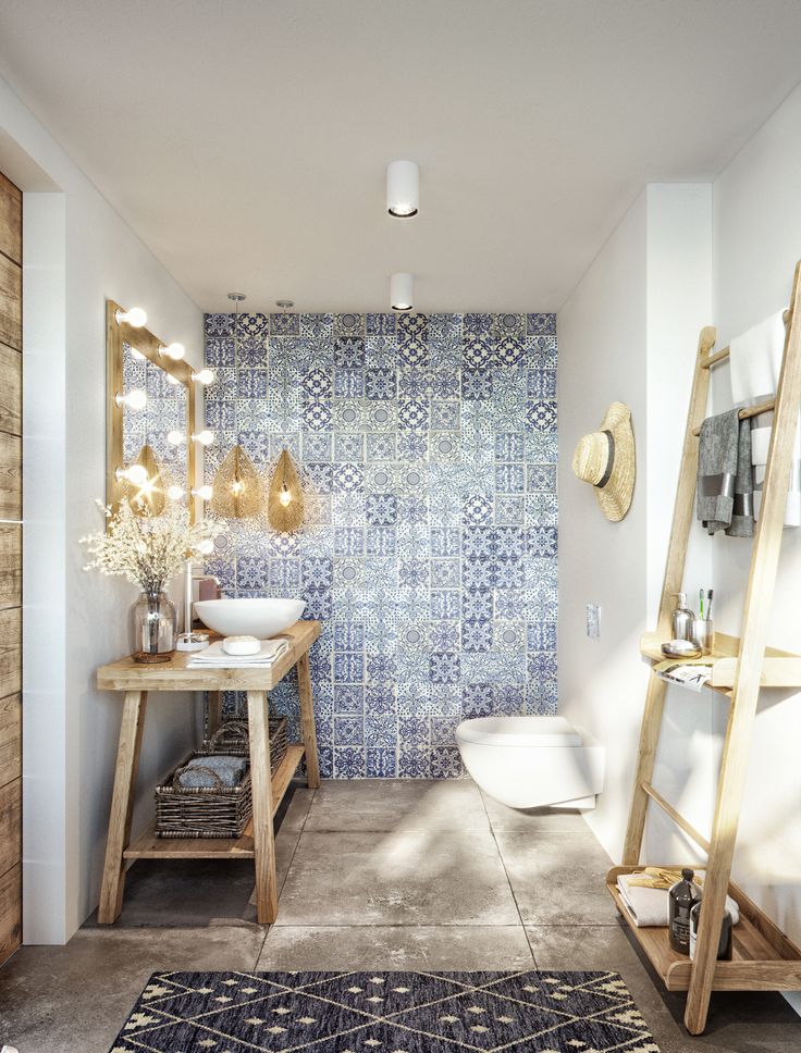 a bathroom with blue and white tiles on the wall, wooden ladders in front of it