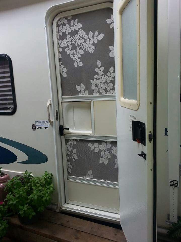 an rv door is open on the outside