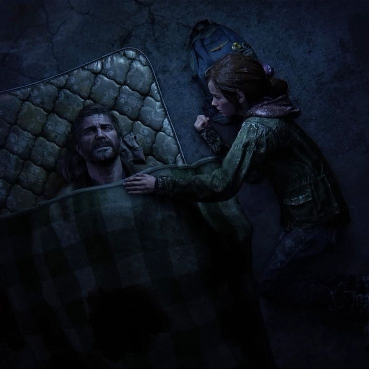 a man and woman are hiding behind a mattress in the dark, with another person looking on