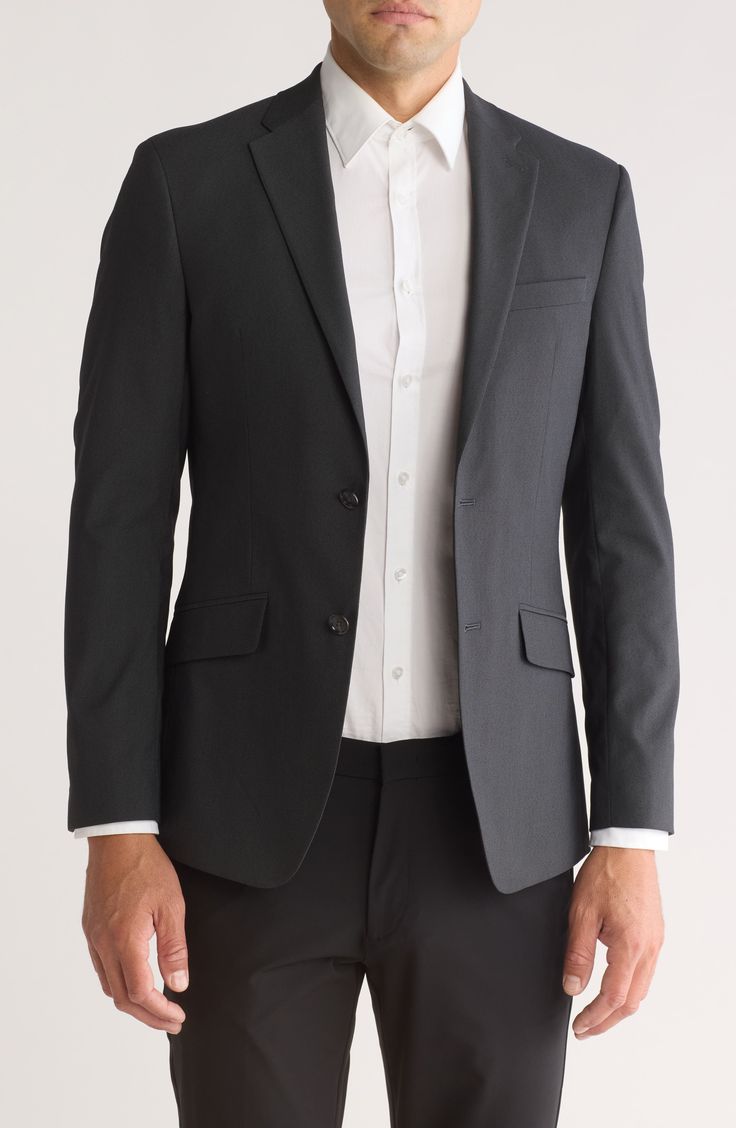 Clean lines and simple details offer a refined appearance in this sophisticated sport coat that's built with a hint of stretch for desk-to-dinner comfort. 30" length (size 38R) Front button closure Notched lapels Long sleeves with button cuffs Front flap pockets; chest welt pocket Lined 76% polyester, 21% viscose, 3% elastane Dry clean Imported Modern Tailored Blazer With Flat Front, Modern Tailored Blazer, Tailored Modern Blazer, Sleek Long Sleeve Business Blazer, Modern Tailored Blazer For Business Casual, Sleek Tailored Solid Color Blazer, Sleek Tailored Solid Blazer, Sleek Tailored Blazer In Solid Color, Modern Semi-formal Sport Coat With Suit Collar