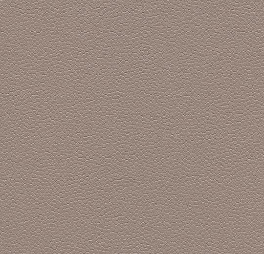 a beige leather textured surface with no visible lines or dots on the top and bottom