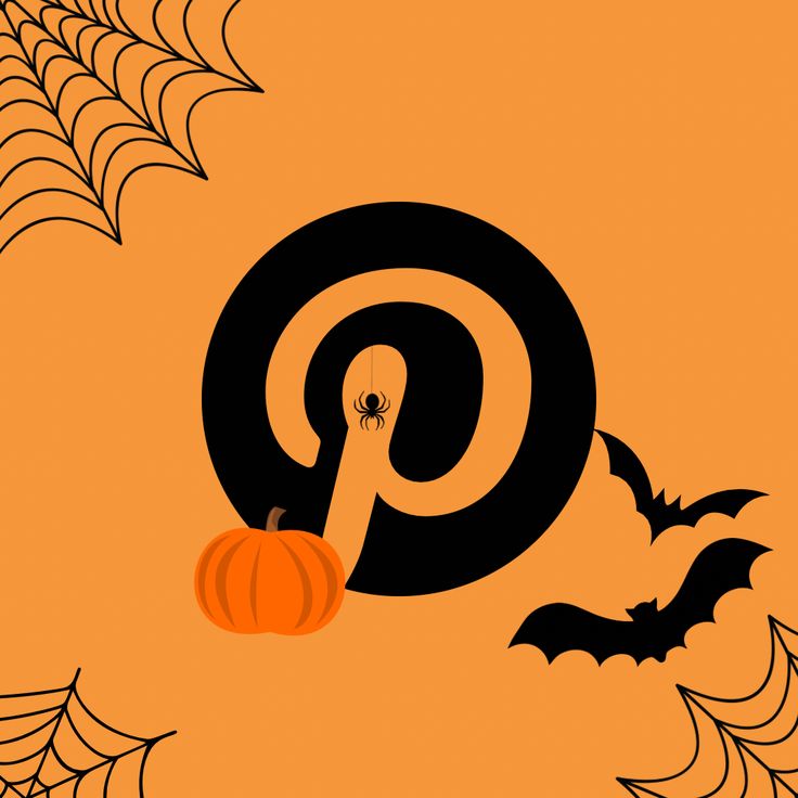 an orange and black pin at halloween with bats on it's side, next to a spider web