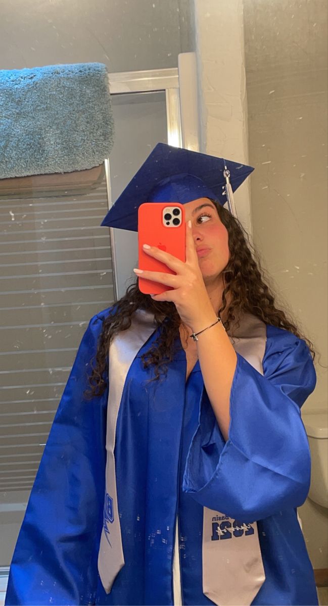 graduation, high school, college, blue cap and gown, photo idea, inspo, curly hair, girl, outfit, red cover iphone Graduation Cap On Curly Hair, Graduation Cap Curly Hair, Curly Hair Cap And Gown, Blue Cap And Gown Graduation Outfit, Curly Hair Graduation Cap, Blue Cap And Gown, Graduation Outfit Ideas High School, Graduation Gown And Cap, Graduation Pose