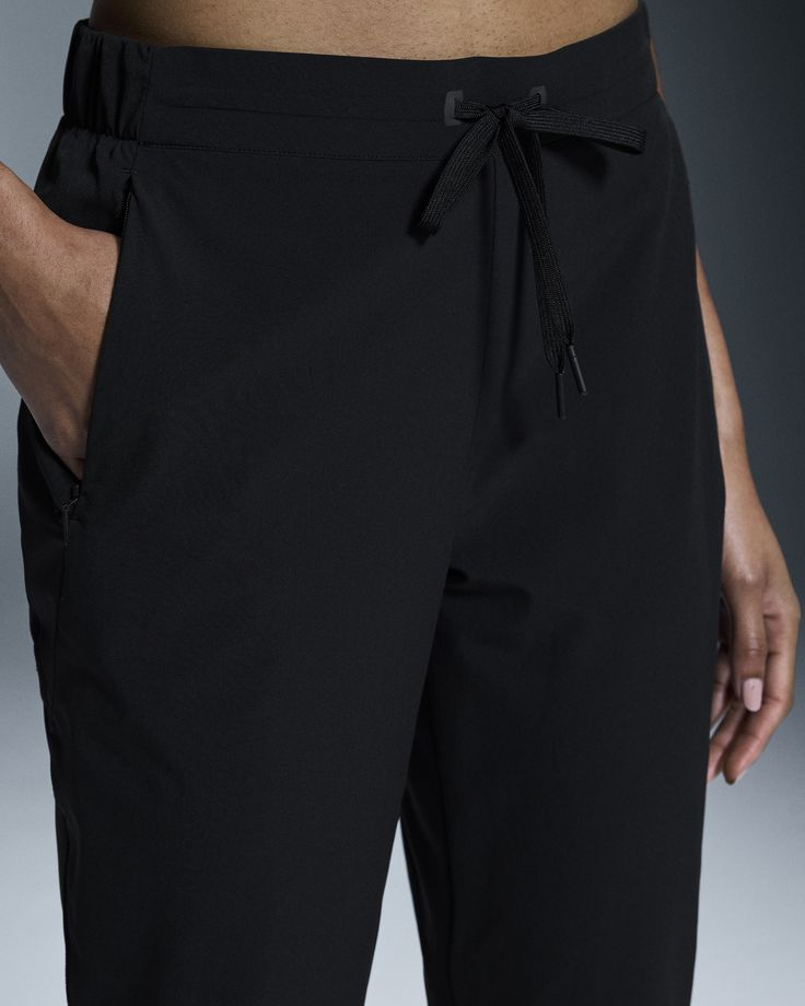 For traveling, recovery and studio time – the ultrasoft Active Pants feature ankle adjustments and pockets for all your essentials Zipped pockets - Your ideal travel companion, the Active Pants have concealed zip pockets big enough for your phone and other essentials. Add on-the-move comfort with pull-on, pull-off convenience – and these will take you places in style. UV-protective fabric - The Active Pants are on guard. Because we combined high-stretch elastane with double-woven polyamide, crea Functional Stretch Pants For Travel, Functional Pants With Elastic Waistband For Travel, Functional Travel Pants With Elastic Waistband, Black Activewear With Pockets For Work, Versatile Workwear Pants With Functional Pockets, Activewear With Elastic Waistband And 4-way Stretch For Travel, Travel Activewear With Elastic Waistband And 4-way Stretch, Versatile Activewear With Side Pockets For Travel, Versatile Activewear For Travel With Side Pockets