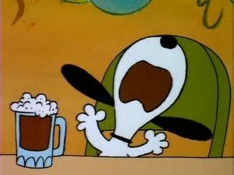 a cartoon character is sitting at a table with a mug and spoon in front of him