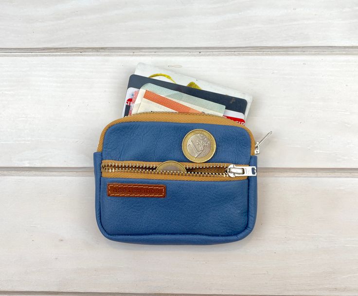 Pocket leather wallet We've used really soft matt leather for our most popular wallet. This blue leather pocket wallet has a suitable size for credit cards and notes with a small pocket for change. It's perfect for small gadgets like chargers, and earphones, ... It has a main central section and an external small zipped pocket. Click here and also here to check other colors of this wallet ►MATERIALS This blue leather pocket wallet it's made of soft leather with 2 natural colored metallic zippers Small Gadgets, Leather Pocket, Leather Coin Purse, Stationery Accessories, Pocket Wallet, Slim Wallet, Money Clip Wallet, Blue Leather, Credit Cards