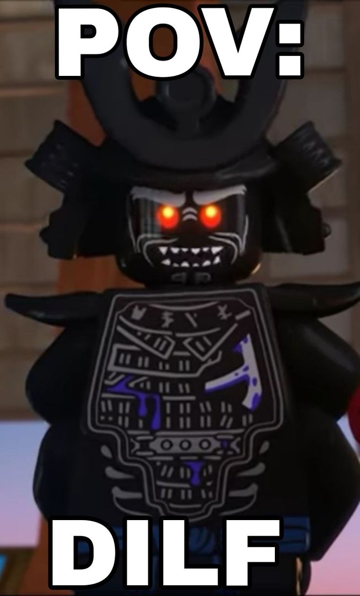 the lego ninja is wearing red eyes and a black mask with horns on it's head