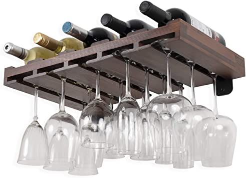 several wine glasses hanging from a wooden rack