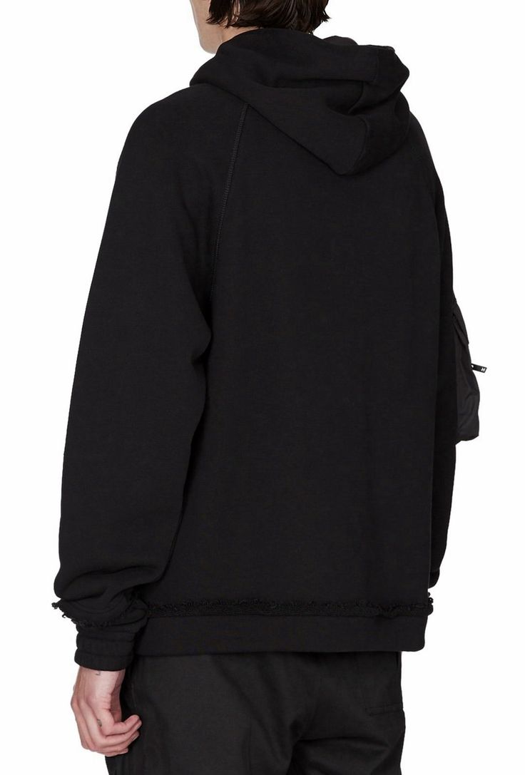 A slightly oversized hoodie in an extra heavyweight loopback cotton. With contrasting nylon military pocket details and black rubberised d rings finished with custom YKK zippers. Softened and piece dyed for the ultimate jersey. Doubled hood with adjuster cords. Hidden elastic cuffs. FRENCH TERRY310 GSM Model is 6’ wearing size Large Functional Cotton Hoodie For Streetwear, Techwear Hoodie With Kangaroo Pocket, Oversized Streetwear Hoodie With Side Pockets, Oversized Hoodie With Side Pockets For Streetwear, Oversized Techwear Hooded Jacket With Drawstring, Oversized Black Hoodie With Side Pockets, Oversized Functional Sweatshirt For Streetwear, Utility Hoodie With Adjustable Hood For Streetwear, Techwear Sweatshirt With Side Pockets For Streetwear