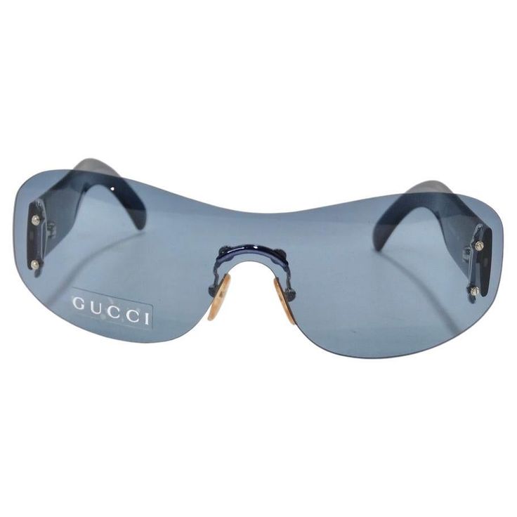 Get your hands on these incredible Gucci dead stock sunglasses circa 1990s! The perfect Y2K shield style sunglasses featuring cool blue lenses alongside blue detailing. These are such a classic and fun statement pair of sunglasses! Match these to your favorite Gucci handbag and pair with some Miu Miu mules for a chic vintage look. Never been worn, new dead stock sunglasses in perfect condition, please see photos. Made in Italy. Mario Testino, Blue Sunglasses, Style Sunglasses, Shield Sunglasses, Blue Lenses, Look Vintage, Gucci Handbags, Sunglasses Vintage, Looks Vintage