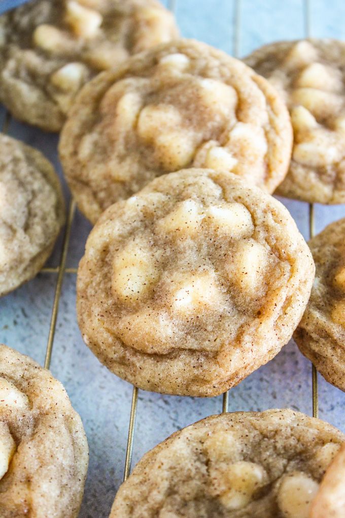 several cookies are cooling on a wire rack