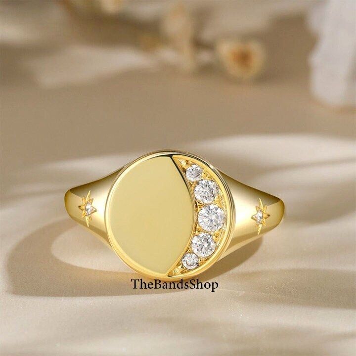 Crescent Half Moon Celestial Band Ring, Sparkling Moon And Star Design In Solid 18k Gold Signet Band, Round Cut Moissanite Diamond Mens Band   ✹✹𝐖𝐞𝐥𝐜𝐨𝐦𝐞 𝐭𝐨 𝑻𝒉𝒆𝑩𝒂𝒏𝒅𝒔𝑺𝒉𝒐𝒑✹✹ ★ 𝑺𝒕𝒐𝒏𝒆𝒔 𝑫𝒆𝒕𝒂𝒊𝒍𝒔 ★ ● Stone Shape:-  Round Cut ● Stone Type:- Simulated Diamond, Moissanite, Lab-Diamond & Natural Diamond ● Stone Size:- 2.80 mm ● Color:- DEF ● Clarity: VVS-VS ● Cut Grade: Excellent ● Making Process: Handmade - Crafted by our experienced team ★ 𝑰𝒕𝒆𝒎 𝑫𝒆𝒕𝒂𝒊𝒍𝒔:- ☛ Metal Purity: Solid Gold (10KT, 14KT, 18KT); Silver(925 Sterling, 935 Argentium), 950 Platinum ☛ Metal Tone: Yellow, White, Rose ☛ Stamp/Hallmark: Yes ★ 𝑪𝒖𝒔𝒕𝒐𝒎𝒊𝒛𝒂𝒕𝒊𝒐𝒏:- ☛ Customized Design Jewelry. ☛ All cuts which you dream to make with moissanite. ☛ Updating every step of your ordered jew Moon And Star Design, Gold Ring Designs, Celestial Jewelry, Moon And Star, Star Design, Platinum Metal, Mens Band, Design Jewelry, Star Designs