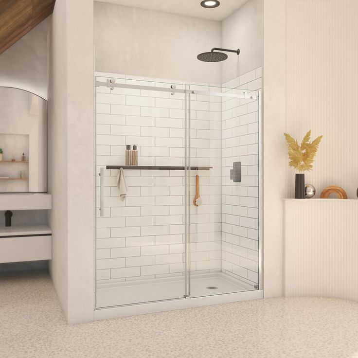 a bathroom with a shower, toilet and sink in it's corner area is shown