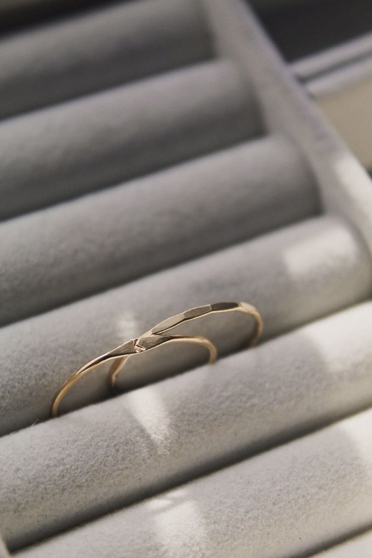 Two of our absolute favourites and best sellers for a reason! Effortlessly enhance your style with this dainty 14K Gold Filled Stacking Ring Set. Extremely comfortable and lightweight. This stunning set will give you a unique, hand crafted and fresh new look. Whether its work or social, this pair will certainly compliment the occasion! A minimalist design perfect as a thoughtful gift or for treating yourself. 1 x 14K Gold Filled Signet Ring 1 x 14K Gold Filled Hammered Stacking Ring Handmade and designed from scratch using 14k Gold Filled. Hammered Stacking Ring: 1.3mm band diameter. Signet Ring: 1mm band diameter and 2.5mm width at the widest point of the signet. Shine Bright Polishing Pad included, can be used to polish your Gold and Silver accessories. * Designed and handmade using the Signet Ring Women, 14k Gold Signet Ring, Gold Ring Women, 2023 Board, Ring Initial, Signet Rings Women, Dainty Gold Rings, Letter Ring, Stacking Ring Set