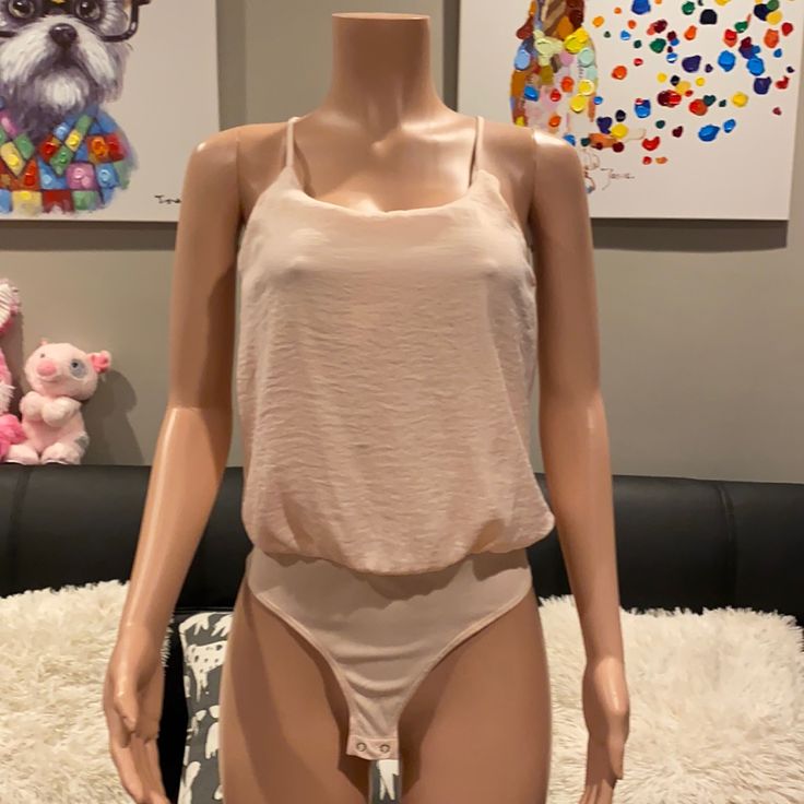 Size Small Brand New, Never Worn. This Bodysuit Is So Cute On With Some High Rise Ripped Mom Jeans Or Shorts. Very Flattering And Classy. Perfect For The Upcoming Warmer Months Straps Are Adjustable. All Offers Accepted Or Countered W. Lowest All Items Are Brand New And Unused Unless Stated Otherwise. Summer Loungewear Bodysuit With Built-in Bra, Casual One-piece Bodysuit With Built-in Bra, Chic Camisole Bodysuit For Night Out, Summer Bodysuit With Built-in Bra For Night Out, Summer Night Out Camisole Bodysuit, Casual Bodysuit With Built-in Bra For Night Out, Spring Camisole Bodysuit For Night Out, Summer Night Out Tank Top With Lined Body, Chic One-piece Bodysuit For Loungewear