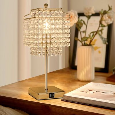 Enhance your home with the Modern Crystal Table Lamp, a blend of elegance and functionality. Available in gold and silver finishes, this lamp features a crystal pendant shade in either purple or clear options. Constructed from stainless steel and crystal, it includes a single E26 bulb socket (bulb not included) and offers dual USB charging ports and stepless dimming capabilities. Perfect for bedrooms, desks, hotels, living rooms, dining areas, and bedside tables, this lamp combines style with pr Living Room Gold, Cute Lamp, Table Lamp Gold, Side Table Lamp, Gold Touch, Crystal Table Lamp, Touch Table, Touch Table Lamps, Lamp Gold