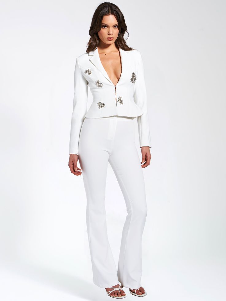 Elevate your style with our Waleria White Stretch Crepe Flare Pants. Made from woven stretch crepe with medium stretch, they offer comfort and sophistication. The flattering flare silhouette elongates the legs and adds glamor to any outfit. Pair them with our Wilda White Crystal Embellished Blazer for a coordinated look or style them separately for versatility. Whether for a formal event or a casual outing, these pants will elevate your ensemble effortlessly. Paired harmoniously with the Wilda P Embellished Blazer, Peplum Blazer, Maxi Dress Cocktail, Stretch Crepe, White Crystal, Dress With Cardigan, Blazer Dress, Lingerie Sleepwear, Product Images