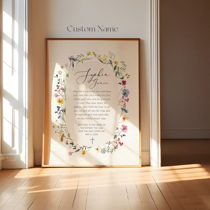 a wooden frame with flowers on it in front of a sign that says custom name