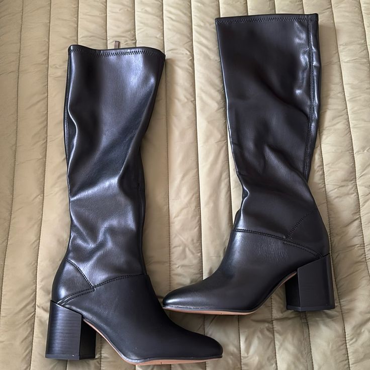 Brand New, Never Worn. Black. 3.5 Inch Heel. Size 7 Classic Black Knee-high Boots With Stacked Heel, Black Wide Calf Knee-high Boots With Reinforced Heel, Black Knee-high Boots With Reinforced Heel And Wide Calf, Black Wide Calf Heeled Boots With Round Toe, Classic Black Knee-high Boots With Almond Toe, Classic Black Boots With Block Heel, Classic Black Knee-high Boots Medium Width, Black Synthetic Almond Toe Heeled Boots, Classic Black Almond Toe Knee-high Boots