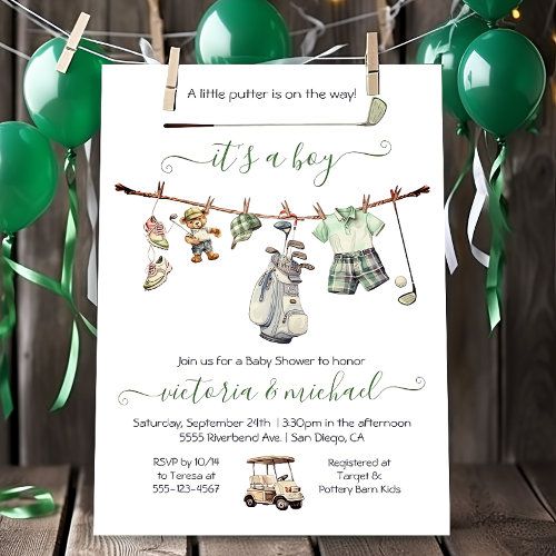 a baby shower with green balloons and streamers on the clothesline, is displayed in front of a wooden background