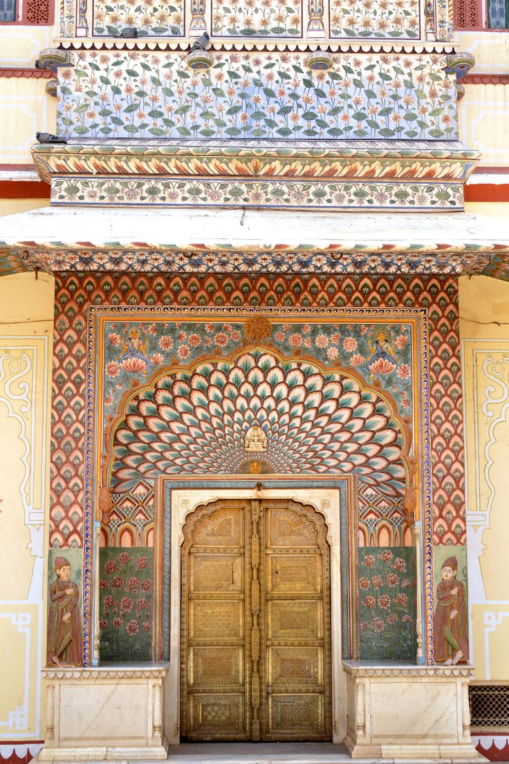 an ornate doorway in the middle of a building