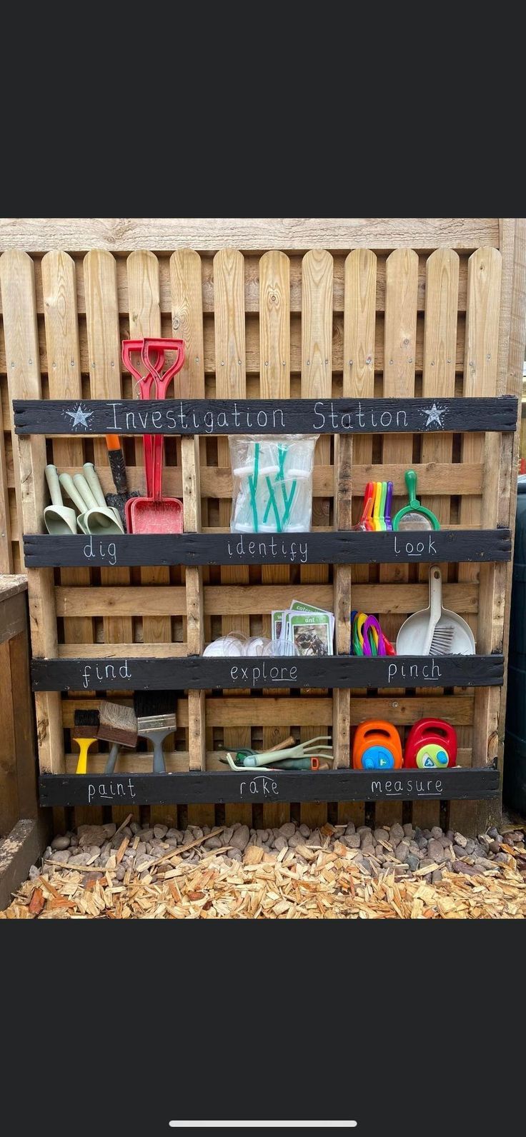 a wooden pallet filled with lots of different items