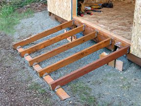 a wooden frame is being built into the side of a building