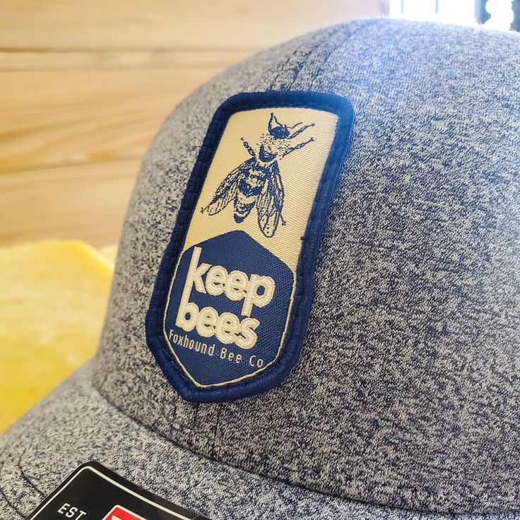 Modeled after the best-selling 112, we designed this cap to have a lower profile and more tailored fit. The Richardson 115 hat is a close favorite design among hat wearers and with the custom, woven Keep Bees logo, it's hard to beat. Each logo is handstitched onto the cap, ensuring it will last Patch Type: Woven Patch Attachment: Hand stitched Patch Size: 2.5” H x 1.375” W Color: Heathered Navy Front with Navy Mesh Back Shape: Casual Structured Richardson 112 Fabric: Cotton-Poly/Nylon Mesh Visor Stitch Patch, The Fox And The Hound, Vanuatu, Tonga, Samoa, Zambia, It's Hard, Sierra Leone, Seychelles