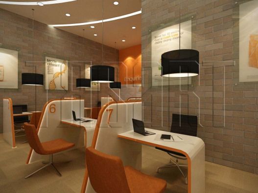 an office with orange chairs and white desks