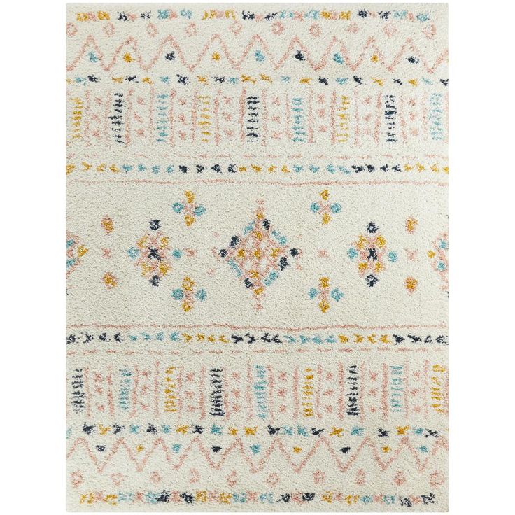 a white rug with multicolored designs on the front and back of it,