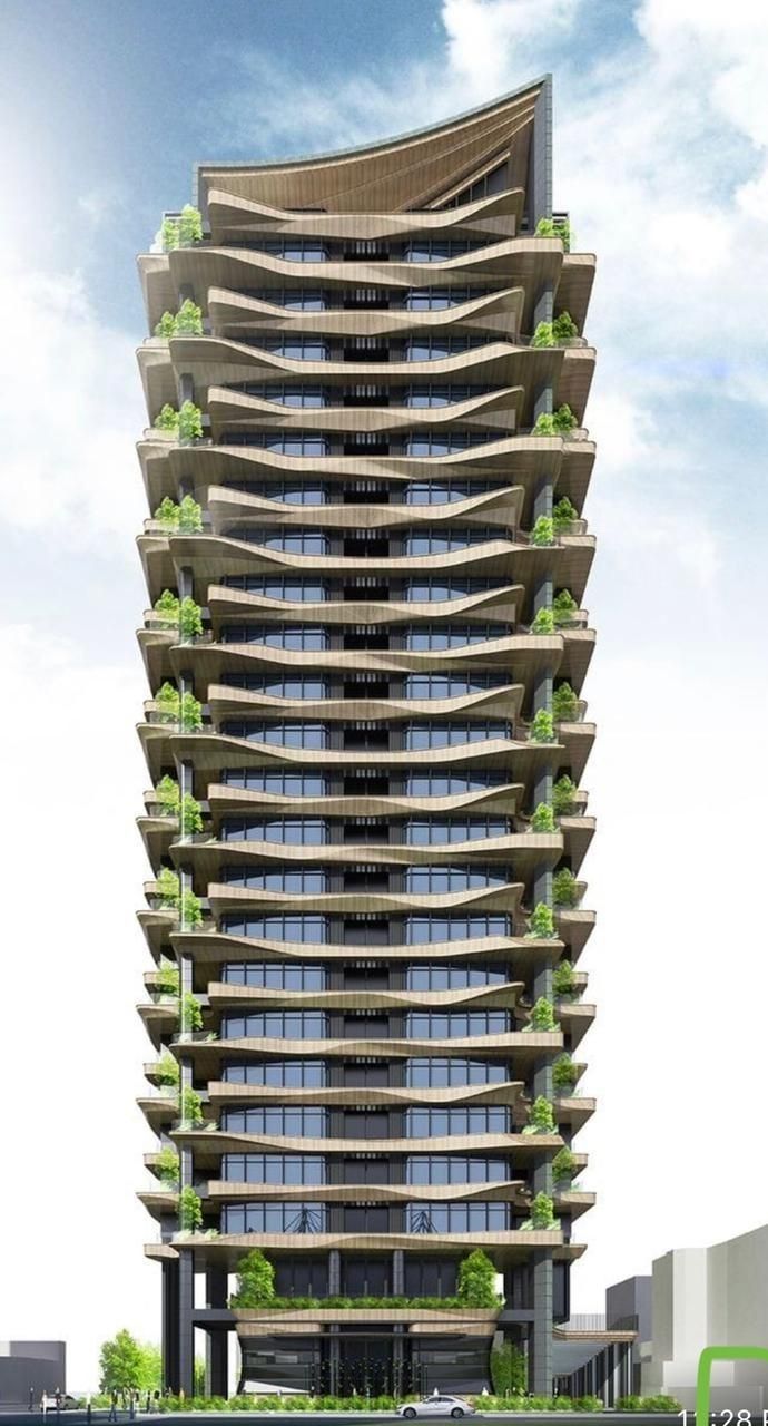 an architectural rendering of a tall building with plants growing on the top and bottom floors