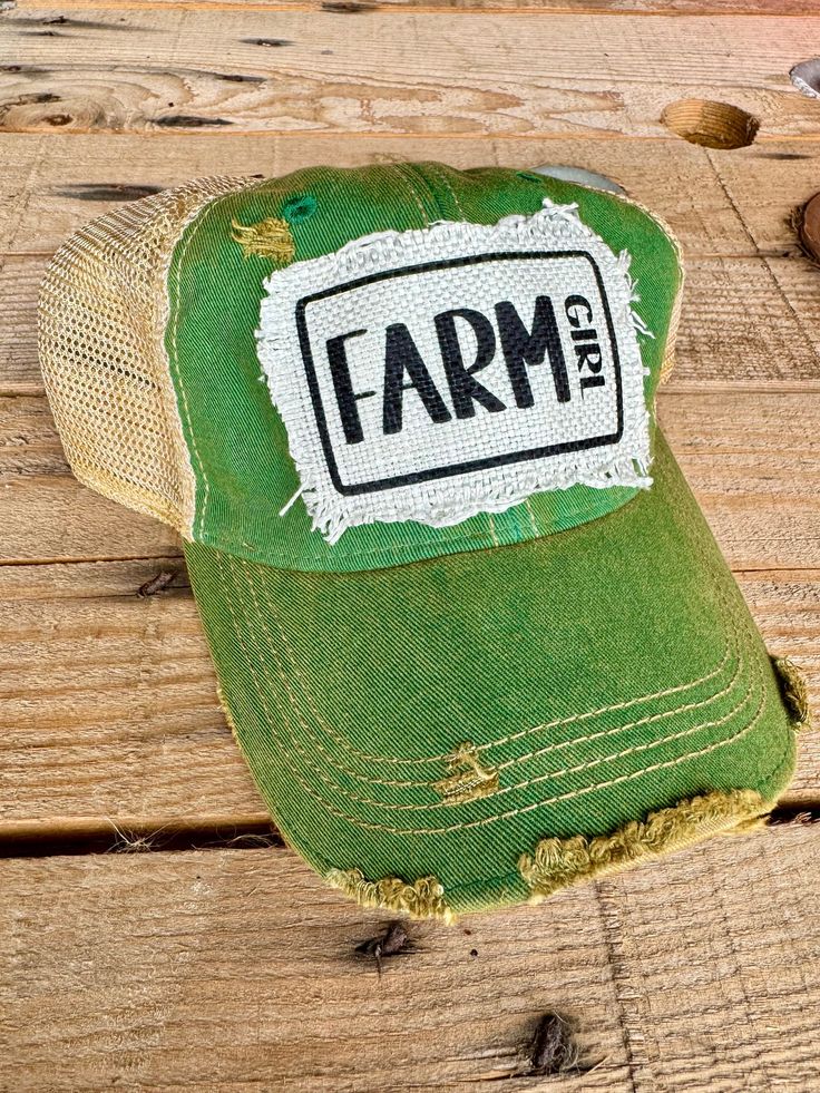 Introducing our Farm Girl Baseball Cap, the perfect accessory for the modern country girl! This distressed vintage style hat exudes a rustic charm that effortlessly blends into any country themed outfit. With its worn-in look and comfortable fit, this cap adds a touch of nostalgia to your fashion choices. Crafted with care, this baseball cap is made to withstand the everyday adventures of a true farm girl. Whether you're out tending crops, riding horses, or simply embracing the countryside lifestyle, our Farm Girl Baseball Cap will keep you stylishly shaded all day long. Upgrade your wardrobe today and let your inner farm girl shine bright! Thank you for shopping! The Stenciled Barn - TSB Apparel Distressed Adjustable Hats For Country Events, Adjustable Distressed Hats For Country Events, Adjustable Distressed Brimmed Hat, Rustic Distressed Adjustable Hat, Vintage Trucker Hat For Country Events, Vintage Distressed Hats For Country Events, Vintage Snapback Trucker Hat For Country Events, Vintage Style Trucker Hat For Rodeo, Vintage Trucker Hat For Rodeo