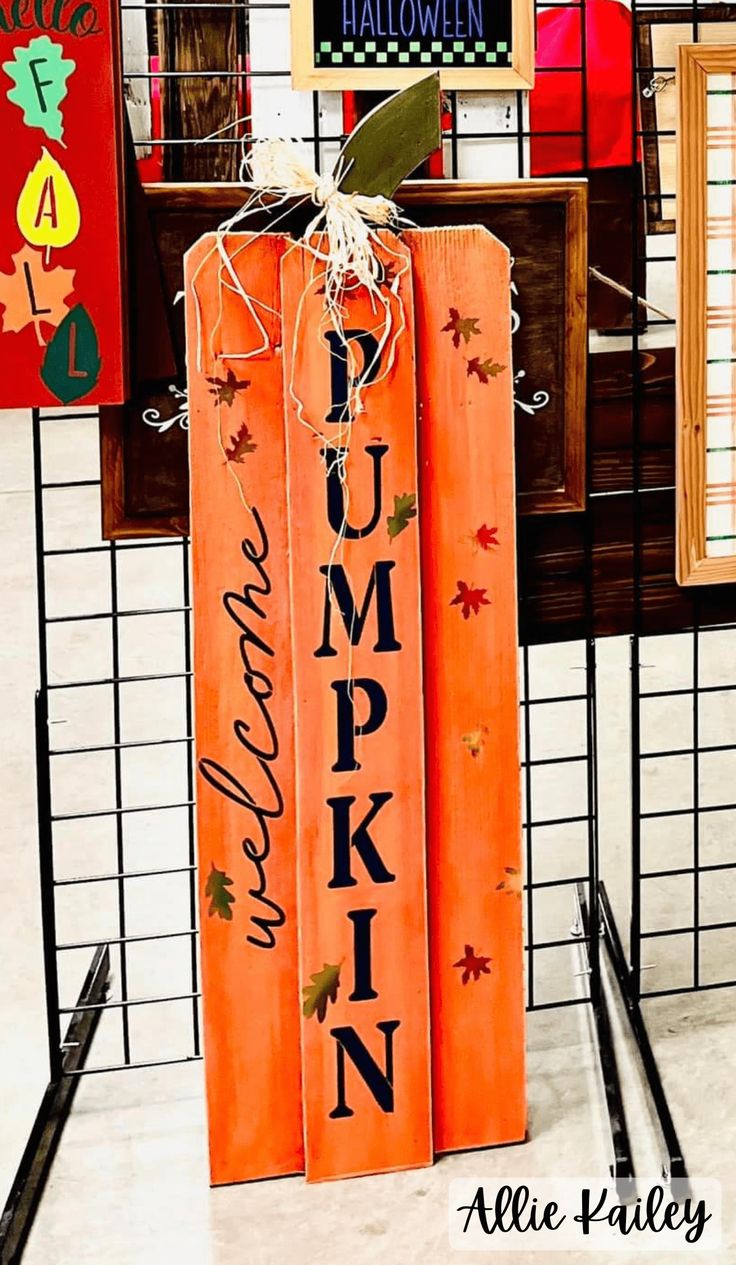 three wooden signs with the words pumpkin on them