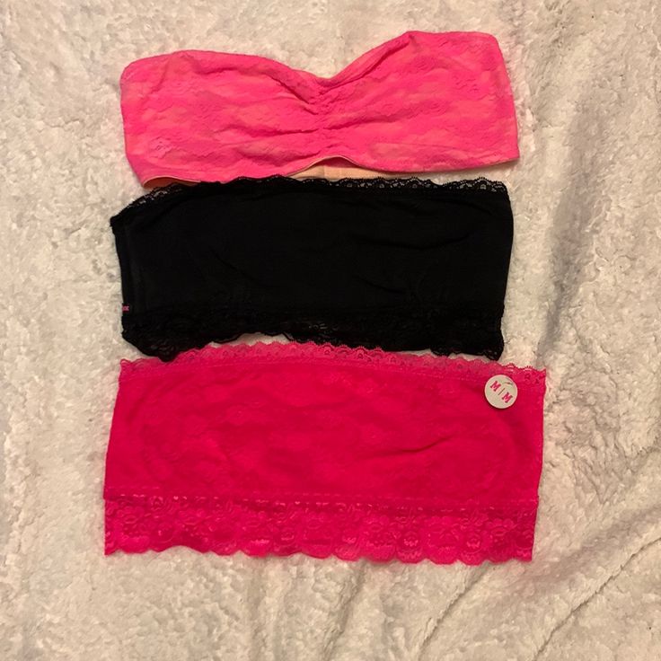 Pink Bras Are Both Size Medium, One New With Tags. Black Is Size Large. From A Smoke Free Home. Casual Pink Seamless Tube Top, Pink Seamless Tube Top, Pink Stretch Seamless Tube Top, Trendy Pink Stretch Tube Top, Pink Fitted Strapless Intimate, Pink Seamless Bandeau Tops, Pink Seamless Strapless Tube Top, Pink Strapless Top With Built-in Bra, Strapless Pink Top With Built-in Bra