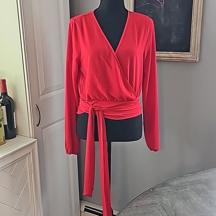 Red Wrap Top, So Versatile And Such A Fun Addition To Any Wardrobe! Red V-neck Tops For Brunch, Red Long Sleeve Blouse For Night Out, Chic Red Party Blouse, Chic Red Blouse For Fall, Red V-neck Tops For Evening, Red V-neck Evening Tops, Elegant Red Tops For Date Night, Elegant Red Top For Date Night, Chic Red Long Sleeve Blouse