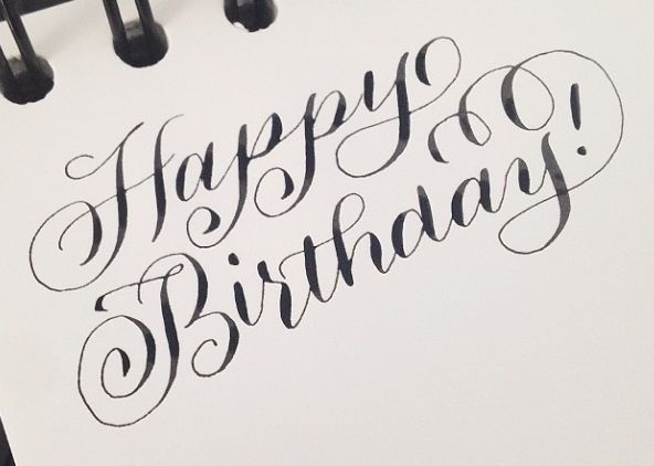 a notepad with the words happy birthday written on it