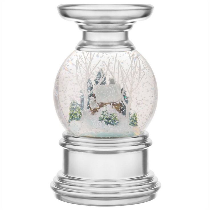 a snow globe with a house in it