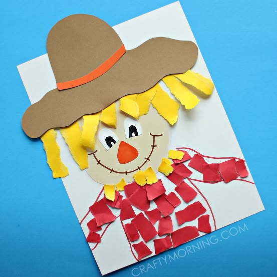 a paper cut out of a scarecrow wearing a hat