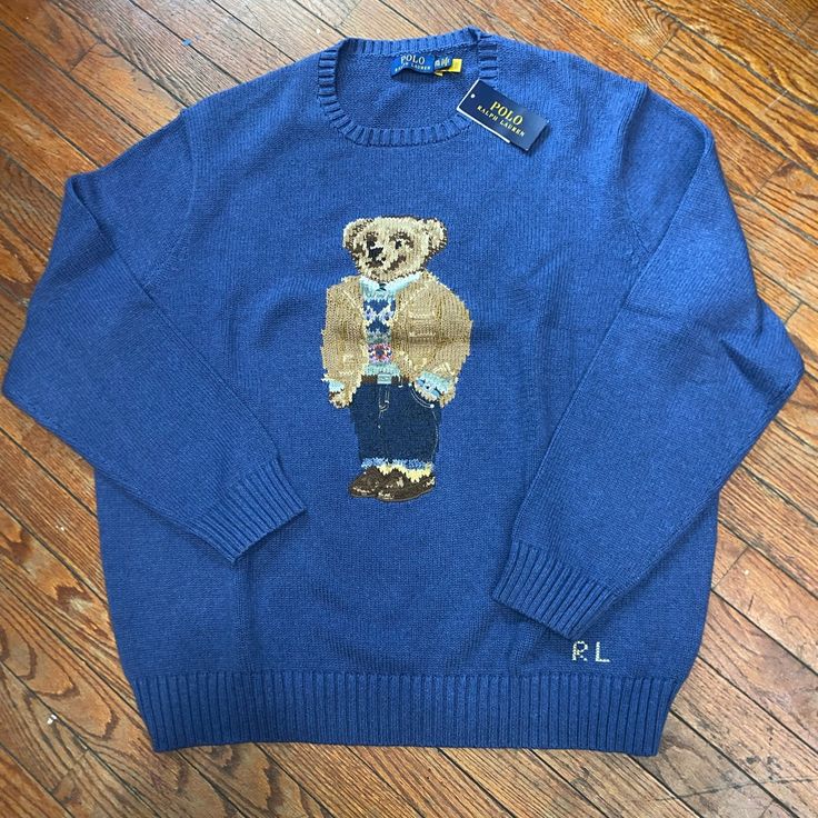 Ralph Lauren Designer Blue Sweater For Winter, Designer Blue Sweater For Fall, Designer Long Sleeve Blue Sweater, Designer Blue Long Sleeve Sweater, Luxury Blue Long Sleeve Sweater, Luxury Blue Wool Sweater, Blue Fitted Wool Sweater, Fitted Blue Wool Sweater, Yellow Cable Knit Sweater